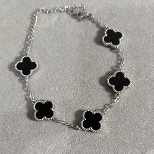 Elegant Silver and Black Clover Bracelet